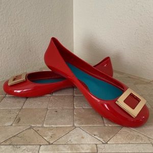 Oka-B red floats with gold buckle